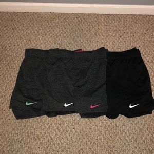 Four pairs of Nike shorts